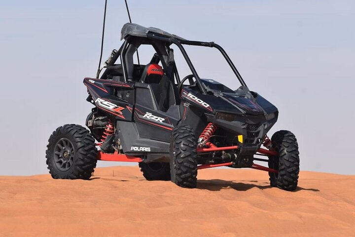 Experience the vast desert landscape as you navigate through stunning sand dunes in your own dune buggy embracing adventure and creating unforgettable memories in Dubai’s remarkable surroundings.